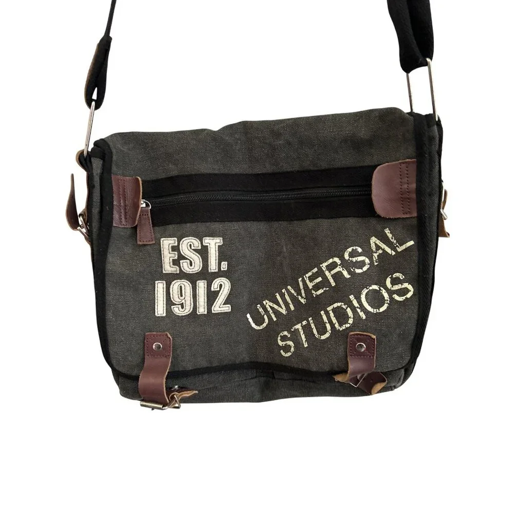 Universal Studios Canvas Messenger Bag With Adjustable Strap & Leather Accents
